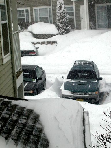 A picture snowdrift-by-a-car